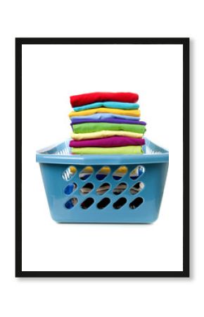 Laundry basket with folded clothes over white backgorund.