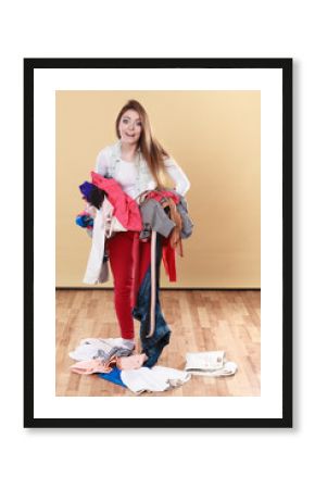 Woman carrying dirty laundry clothes.