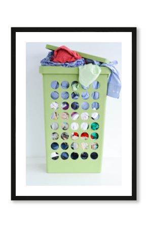 Full laundry basket with dirty clothes