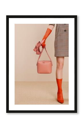 Stylish Woman Holding Pink Handbag With Red Gloves and Shoes