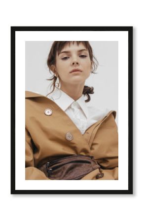 Trendy female / fashion model in abstract white space.
