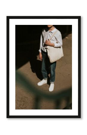 Casual man with eco bag dark tone