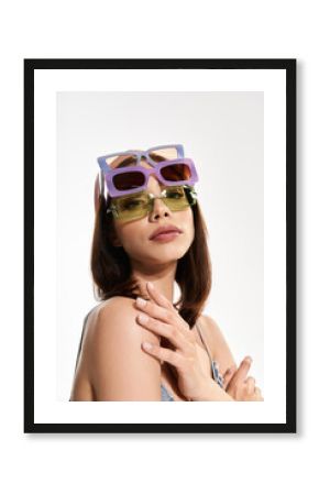 Stylish woman showcases vibrant fashion and bold accessories in modern attire