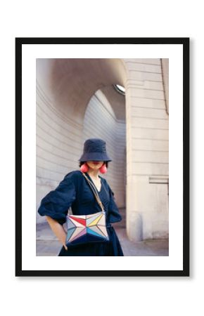 Fashionable Woman With Colorful Bag in Urban Setting