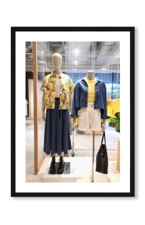 Ladies and guys fashion mannequin display inside the boutique