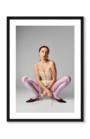 Stylish young woman showcases the latest fashion trends in a modern studio setting