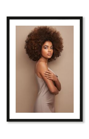 Beauty portrait of African American girl with afro hair. Beautiful black woman. Cosmetics, makeup and fashion