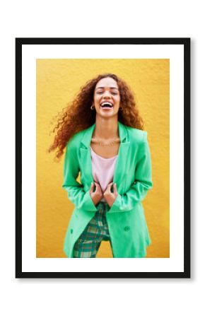 Portrait, fashion and woman laughing on yellow background, color wall and backdrop with smile in Colombia. Happy young female, trendy style and green clothes for beauty, curly hair and gen z model