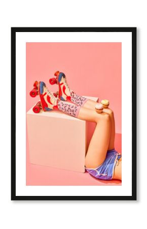 Slender female legs in vintage rollers and funny socks with delicious muffins, cakes against pink background. Party and celebration. Concept of pop art photography, creative vision, imagination.