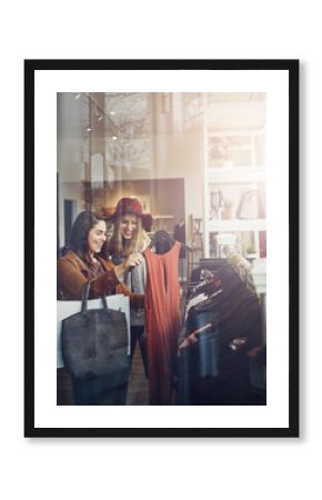 Shopping, boutique and girl friends by clothes in retail mall for discount, sale or promotion. Style, window and young women bonding and buying designer outfit on rack at luxury fashion store.