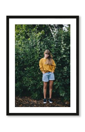 Beautiful hipster girl posing  in the park