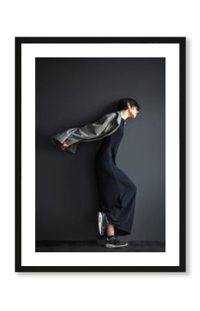 fashion lonely girl in motion on dark background