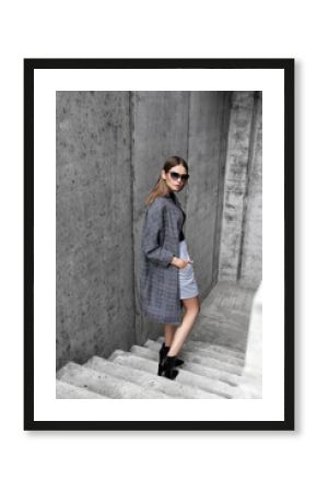 high fashion portrait of young elegant woman outdoor.