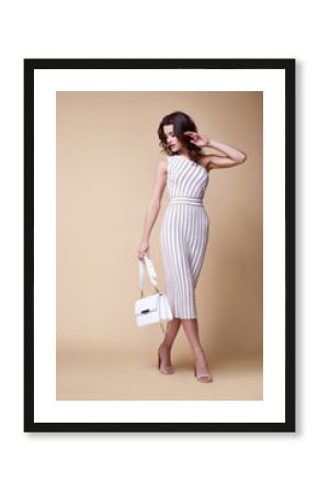 Pretty beautiful sexy elegance woman skin tan body fashion model glamor pose wear trend dress casual clothes party summer collection makeup hair style brunette success accessory jewelry studio.
