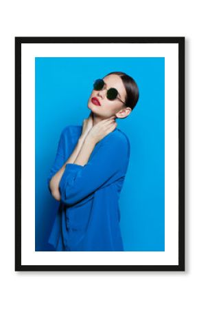 fashion model in sunglasses, beautiful young woman.