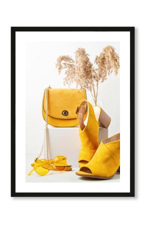 Yellow female fashion accessories, shoes, sunglasses and handbag. Beauty, shopping, urban outfit and fashion trends concept