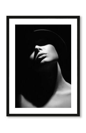 Beautiful woman in hat. Girl with face under Shadow