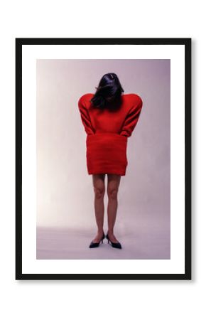 Avant-Garde Fashion Model in Oversized Red Sweater