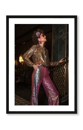 Glamorous disco fashion in glittering gold and pink sequins