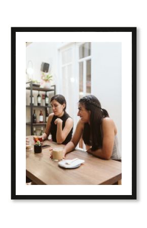 Woman eating with friends and laughing