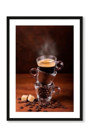 glass cups, in sequence vertically, with coffee beans, ground, and steaming drink. still life