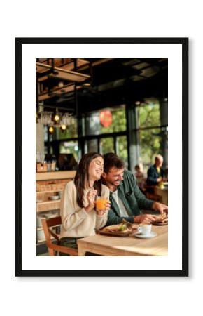 Enjoying a delightful brunch together at a cozy cafe on a sunny afternoon in the heart of the city