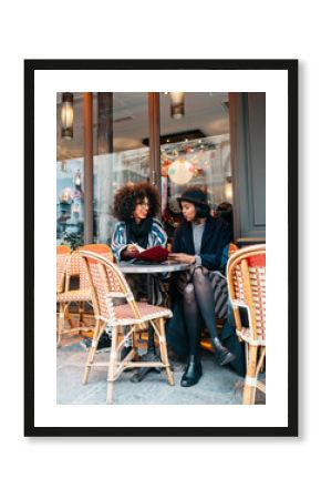 two women in cafe