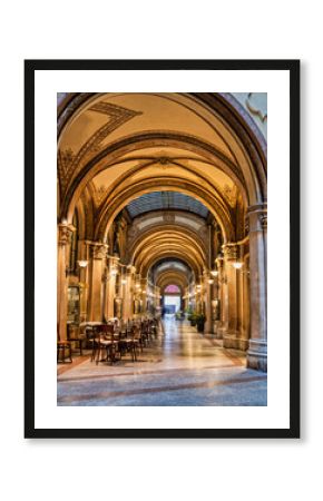 Vertical shot of Ferstel Parisian shopping arcade passages in Vienna, Austria