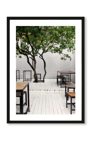 Outdoors cafe with white wooden floor