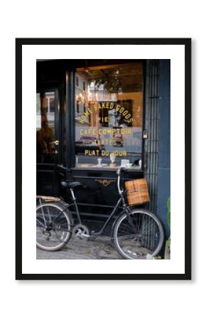 Vintage bicycle in front of a cafe in Europe