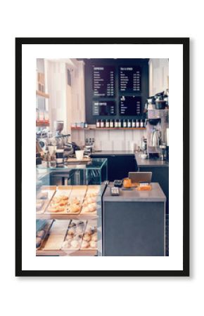 Interior design details of empty modern coffee shop restaurant at daytime. Small local business. Environment workplace of food drink server.