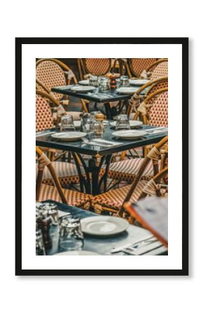 A row of chairs and tables at a outdoor cafe on Hardware Lane Bourke Street and Little Lonsdale Street, Melbourne, Australia