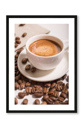 Cup of coffee with grains.