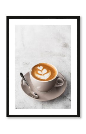White cup of hot latte coffee with beautiful milk foam latte art texture isolated on bright marble background. Overhead view, copy space. Advertising for cafe menu. Coffee shop menu. Vertical photo.