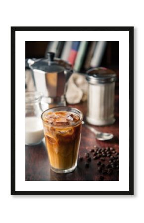 iced coffe with milk and book cafe background