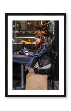 shopping woman resting in a cafe