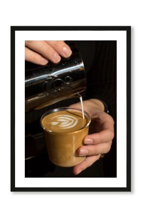 Barista making flat white coffee