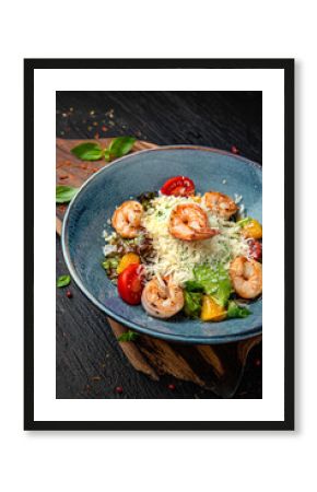 Caesar and shrimp salad. Menu for a pub on a dark background. Colorful juicy food photography.