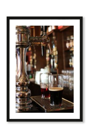 Chrome beer taps with highlights in the pub