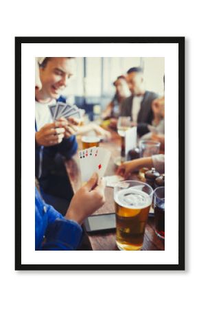 Woman holding aces four of a kind playing poker drinking beer friends at bar