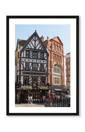 George Pub in Great Portland Street, West London in England. People around