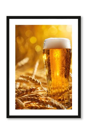 Beer glass and wheat background with copy text space for advertisement or promotion. Ideal for brewery, pub, bar, celebration, party, and summer events.