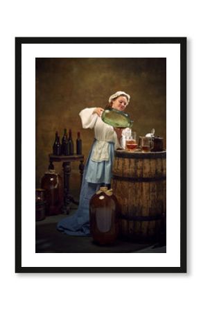 Woman brewer, dressed old-fashion clothes, serving beer, pouring drink to glass at ancient pub against vintage background. Concept of bar, pub, Bavarian style, Oktoberfest. Comparisons of eras.