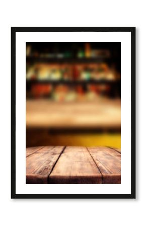 Wooden table in the pub bar, dark interior