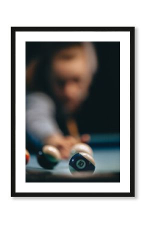 Woman playing pool game