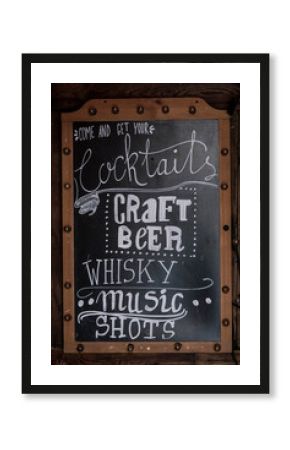 Sign advertising for drinks and music