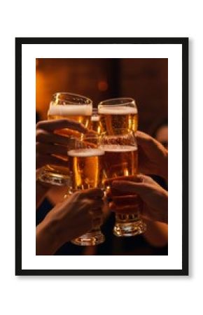 Friends toasting with beer glasses in warm pub atmosphere. Celebration concept for Oktoberfest, St. Patrick's Day, or casual gathering. Social drinking and camaraderie.