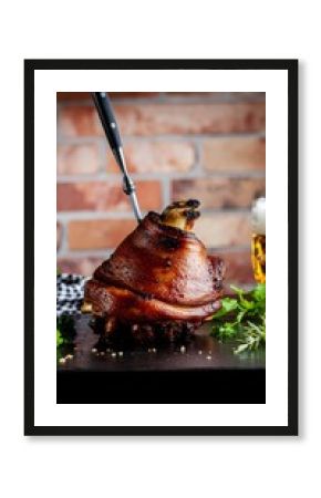 Bavarian Crispy Pork Knuckle Roasted Schweinshaxe with Fork in Rustic Pub Setting