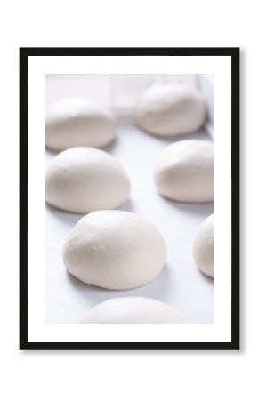 Pizza ball dough on white tray 