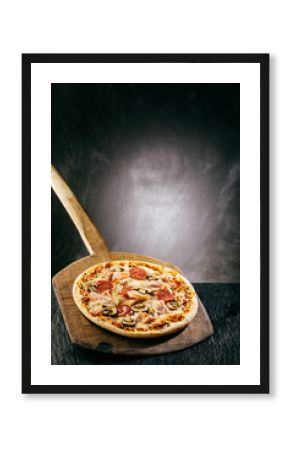 Flame grilled ham and pepperoni pizza